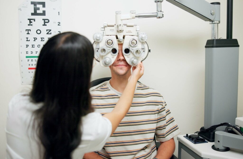 A person getting their prescription tested during a routine eye exam